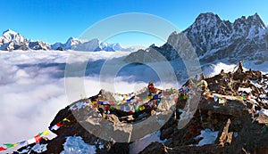 View from mount Gokyo Ri peak with prayer flags