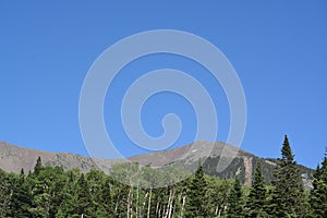 The view of Mount Humphreys and its Agassiz Peak. One of the San Francisco Peaks in the Arizona Pine Forest. Near Flagstaff, Cocon