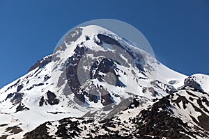 View of Mount Kazbek, near Stepantsminda. Georgia. photo