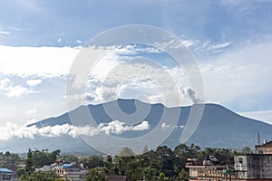 View of Mount Marapi during a small eruption in Bukittinggi, West Sumatra