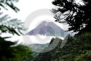 View of Mount Merapi in the morning, and slightly covered by clouds. Potentially eruptive volcano