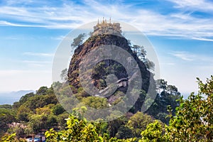 View of Mount Popa with temples atop in Myanmar