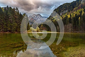 View of Mount Skuta. Plansar Lake or Plansarsko jezero on valley Zgornje Jezersko in northern Slovenia