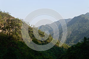 The view of mountain, blue sky, greenery, the beauty of nature of the famous neer waterfall, rishikesh, Uttarakhand, India