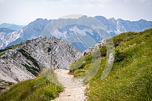View from mountain Hochobir, Austria, with hiking path to Karawanks photo