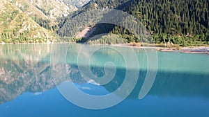 View of the mountain lake Issyk from a height.