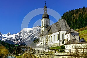 View on mountain landscape and church by Ramsau in Bavaria