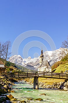 View on mountain landscape and church by Ramsau in Bavaria