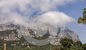 View of the mountain peaks of AI-Petri against the blue sky and white clouds.Crimea