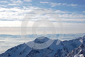 View mountain peaks of High Tatras from Lomnicky Peak.