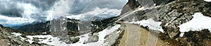 View of the mountain peaks and rocks of the Dolomites in Italy in the Auronzo di Cadore in Tyrol, under a overcast dramatic sky