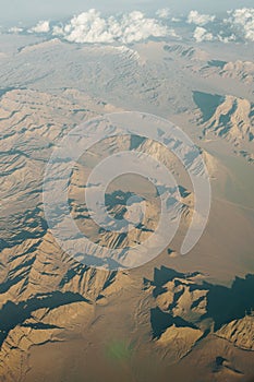 View of a mountain range with clouds over Iran