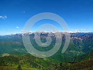 View of a mountain range in Julian alps in Gorenjska, Slovenia above Baska Grapa photo