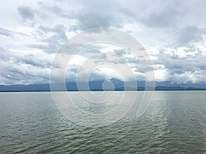 View Mountain river water landscape with mountains and Cloud in background.