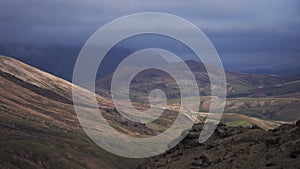 View mountain valley with green, foggy hills. Laugavegur hiking trail, Iceland