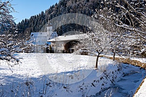 View of the mountaineering village of Sachrang in Chiemgau, Bavaria, Germany in winter photo