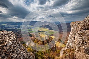 View of the mountainous landscape with rock formations in partly