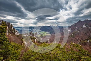 View of the mountainous landscape with rock formations in partly