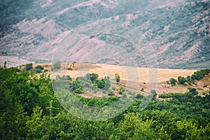 View of mountains Babadag in the clouds and a river Girdimanchay Lahij yolu from the side in Lahic village, Azerbaijan