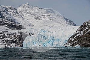 View of mountains and blue icebergs