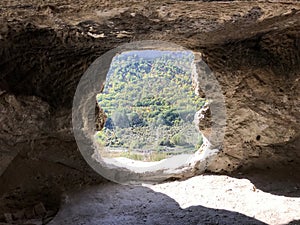 View of the mountains from the cave window. Cave city of ancient Christians Kachi Kalon