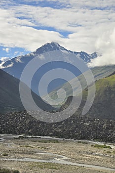 View of mountains covered with clouds from the peak with Bhaga river in Darcha