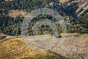 View of mountains in Crimea with off road 4x4 car.