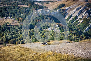 View of mountains in Crimea with off road 4x4 car.