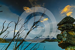 View of the mountains and the lake during the sunrise of Torres del Paine National Park. Autumn in Patagonia, the