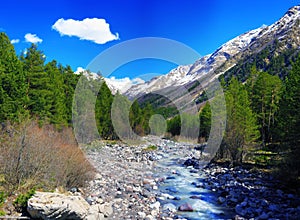 View of the mountains and river into the valley. Elbrus area