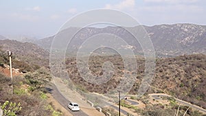 View of mountains road with traffic.