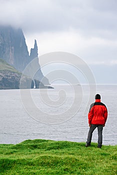 View of Mountains and Rocks of Witches Finger Near Sandavagur Village on Vagar