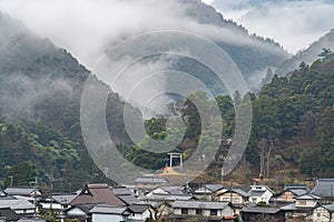 View of mountains and rural scene in foggy weather, Japanese country landscape