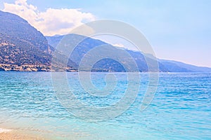 View of the mountains and the sea from Oludeniz beach, the blue lagoon. The cleanest beach with blue flag. Background