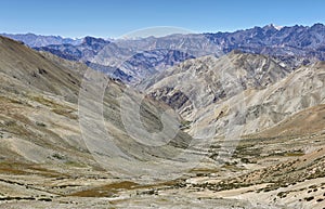 View of mountains and snow capped peaks of himalaya`s from Ganda La Pass in Markha Valley Trek, Ladakh, India