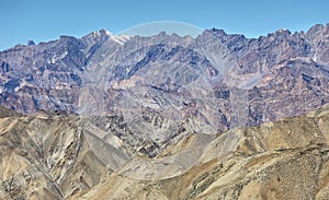 View of mountains and snow capped peaks of himalaya`s from Ganda La Pass in Markha Valley Trek, Ladakh, India