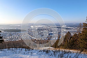 View from the mountains to the winter Ural city Miass