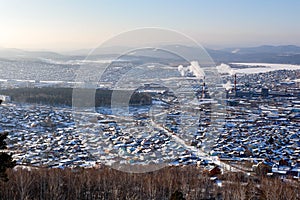 View from the mountains to the winter Ural city Miass