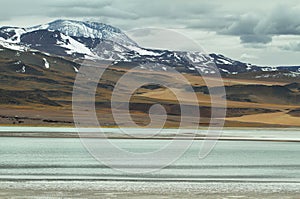 View of mountains and Tuyajto lagoon in Sico Pass