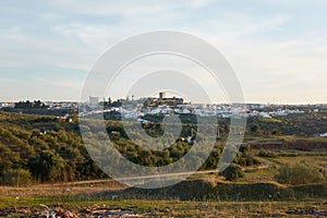 View of Moura city with olive trees on the foreground in Alentejo, Portugal photo