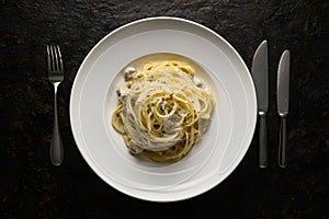 view A mouthwatering display of spaghetti alla carbonara captured in foodgraphy