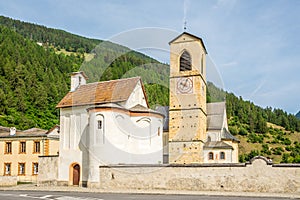 View at the Movastery and Bell tower of Saint John church in Mustair, Switzerland