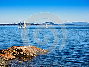 View on Mt. Baker from Vancouver Island, Canada, with sailboats