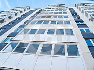 View of multi-apartment multi-storey residential building, panel monolithic new building, renovation, new residential areas