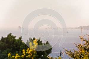 View of multiple Islets that stand out in the Pacific Ocean amid the haze in Southern Oregon, USA