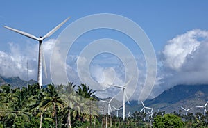 View of Multiple wind mills in a field in India