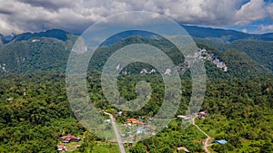 View of Mulu village with tropical forest and mountains near Gunung Mulu national park. Borneo. Sarawak.