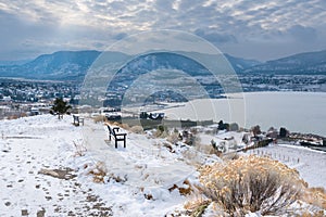 Winter view of Penticton covered in snow with view of Okanagan Lake and mountains photo