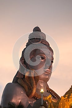 View of Murudeshwar Temple at sunset - Lord Shiva statue - Gopura - India religious trip - Hindu religion