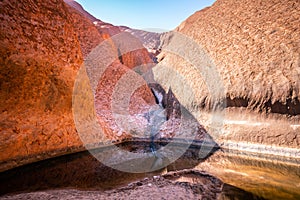 View of the Mutitjulu waterhole on summer time with clear sky in NT outback Australia photo